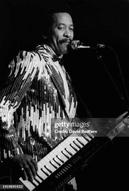 American musician, singer, songwriter and record producer Allen Toussaint playing a Yamaha KX-5 MIDI controller, circa 1985.