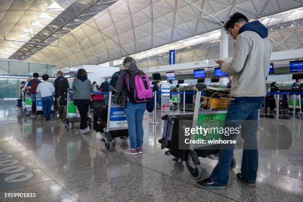 united airlines check-in counters - cartgate out stock pictures, royalty-free photos & images