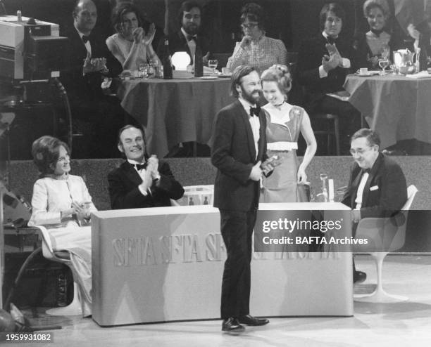 The Princess Anne , with Lord Birkett and Aubrey Singer , presents an award at the Society of Film & Television Arts Awards, Thursday 4 March 1971,...