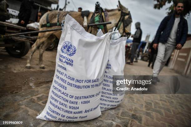 Bags of flour are seen at the area where UNRWA distributes flour to families as Israeli attacks continue in Rafah of Gaza on January 28, 2024....