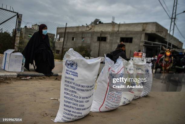 Bags of flour are seen at the area where UNRWA distributes flour to families as Israeli attacks continue in Rafah of Gaza on January 28, 2024....