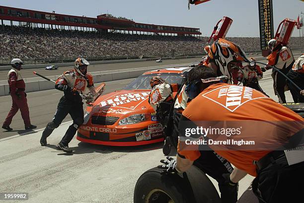 Tony Stewart pits the Joe Gibbs Racing Chevrolet during the NASCAR Winston Cup AUTO CLUB 500 on April 27, 2003 at the California Speedway in Fontana,...