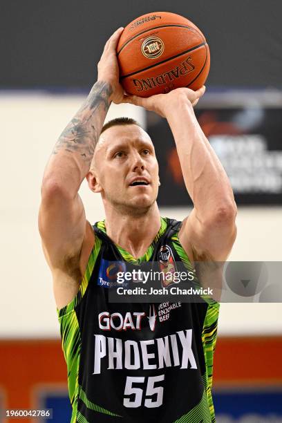 Mitchell Creek of the Phoenix shoots a free throw during the round 17 NBL match between South East Melbourne Phoenix and Sydney Kings at State...