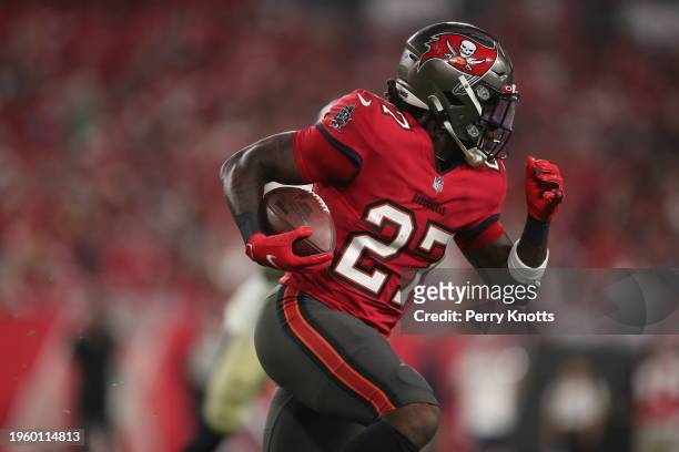 Ronald Jones of the Tampa Bay Buccaneers runs upfield against the New Orleans Saints during a game at Raymond James Stadium on December 19, 2021 in...