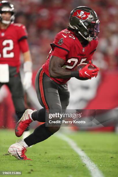 Ronald Jones of the Tampa Bay Buccaneers runs upfield against the New Orleans Saints during a game at Raymond James Stadium on December 19, 2021 in...