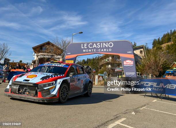 Monte Carlo , France - 28 January 2024; Thierry Neuville and Martijn Wydaeghe in their Hyundai i20 N Rally1 Hybrid at the finish line after winning...