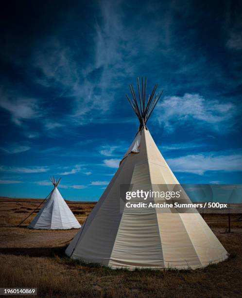 low angle view of building against cloudy sky,denver,colorado,united states,usa - denver summer stock pictures, royalty-free photos & images