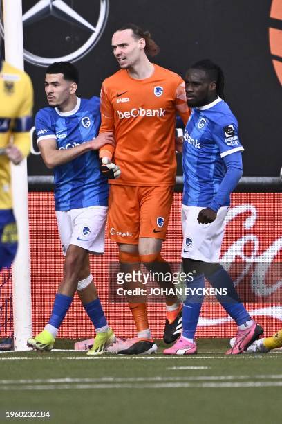 Genk's goalkeeper Maarten Vandevoordt and stop a penalty during a soccer match between Sint-Truidense VV and KRC Genk, Sunday 28 January 2024 in...