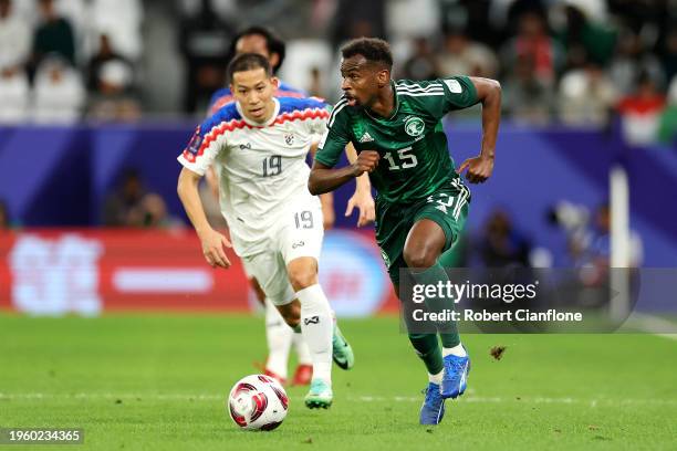 Abdullah Al-Khaibari of Saudi Arabia runs with the ball during the AFC Asian Cup Group F match between Saudi Arabia and Thailand at Education City...