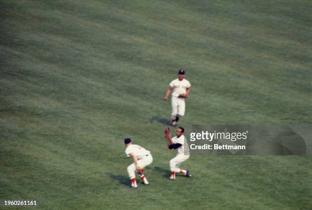 Boston Red Sox rightfielder Jose Tartabull catches St Louis Cardinals Roger Maris' pop in the first inning of the second world series game, Boston,...