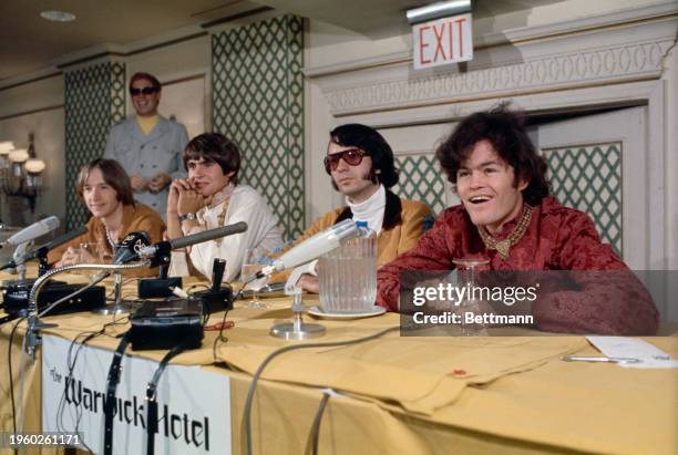 American pop group The Monkees holding a press conference at the Warwick Hotel in New York, July 6th 1967. Left to right: Peter Tork , Davy Jones ,...