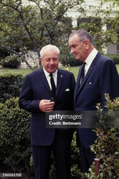 Australian Prime Minister Harold Holt and US President Lyndon Johnson walking in the White House Rose Garden in Washington, June 1st 1967.