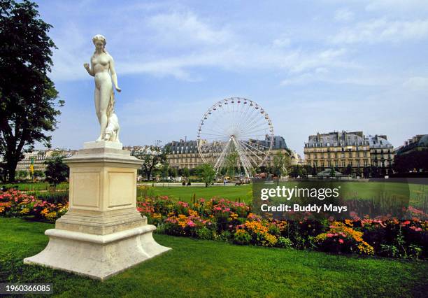 The Nymphe, a sculpture by Auguste Levêque, one of many statues in the Tuileries Gardens, Les Jardins de Tuileries, in Paris, France, 2005. .