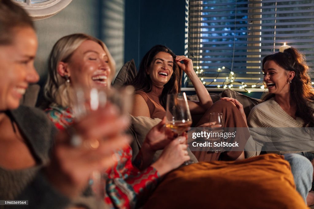 Laughing on the Sofa Together