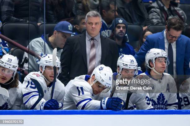 Toronto Maple Leafs head coach Sheldon Keefe looks on during the second period of their NHL game against the Vancouver Canucks at Rogers Arena on...
