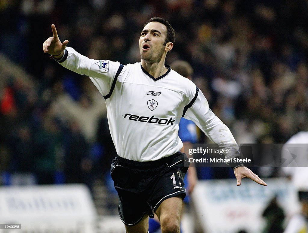 Youri Djorkaeff of Bolton Wanderers celebrates scoring the third goal