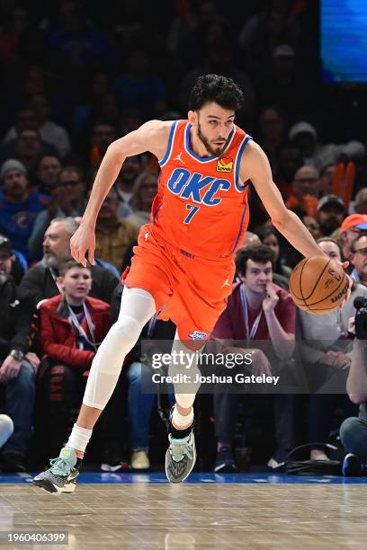 Chet Holmgren of the Oklahoma City Thunder handles the ball during the first half against the Portland Trail Blazers at Paycom Center on January 23,...