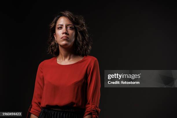 portrait of unsure young woman looking away, contemplating - attitude stock pictures, royalty-free photos & images