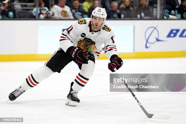 Taylor Raddysh of the Chicago Blackhawks skates against the Seattle Kraken during the third period at Climate Pledge Arena on January 24, 2024 in...