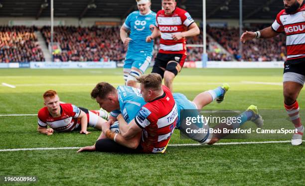 Sale Sharks' Cobus Wiese is held up by Gloucester's Ollie Thorley during the Gallagher Premiership Rugby match between Gloucester Rugby and Sale...