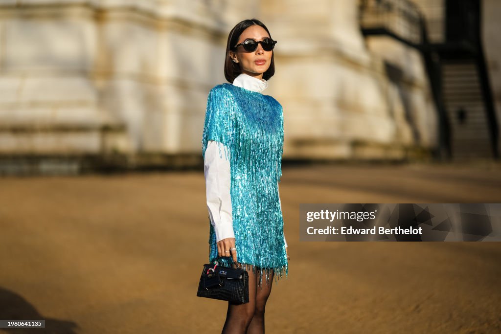 Street Style - Paris Fashion Week - Haute Couture Spring/Summer 2024 - Day Three