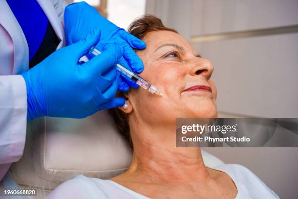 mesotherapy for face - facelift stock-fotos und bilder