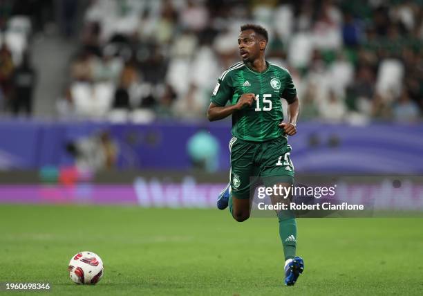Abdullah al-Khaibari of Saudi Arabia runs with the ball during the AFC Asian Cup Group F match between Saudi Arabia and Thailand at Education City...