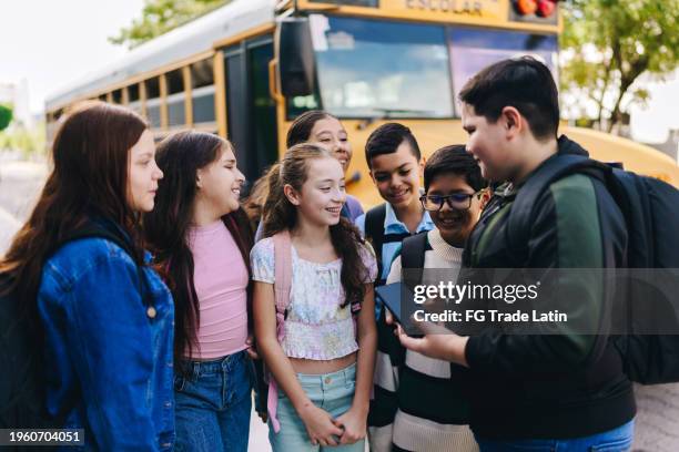 child student friends talking outdoors - junior high student stock pictures, royalty-free photos & images
