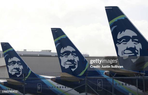 The Alaska Airlines logo is displayed on the tail section of Alaska Airlines planes a San Francisco International Airport on January 25, 2024 in San...