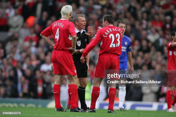 October 2: Referee Graham Poll Calms Jamie Carragher of Liverpool during the Premier League match between Liverpool and Chelsea at Anfield on October...