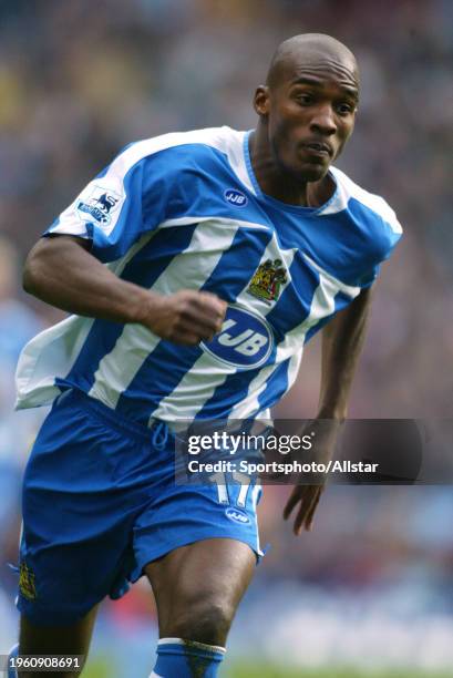 October 22: Damien Francis of Wigan Athletic running during the Premier League match between Aston Villa and Wigan Athletic at Villa Park on October...