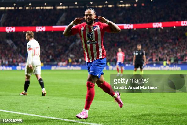 Memphis Depay of Atletico de Madrid celebrates after scoring the team's first goal during the Copa del Rey Quarter Final match between Atletico de...