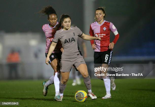 Atlanta Primus of Southampton FC and Kit Graham of Tottenham Hotspur battle for the ball during the FA Women's Continental Tyres League Cup match...