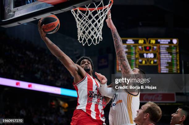 Vincent Poirier of Real Madrid and Saquielle McKissic of Olympiacos Piraeus in action during the Turkish Airlines EuroLeague Regular Season Round 23...