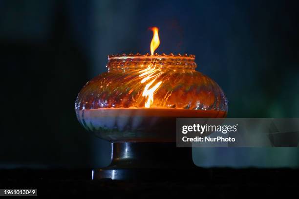 Candle is seen standing on the Auschwitz Memorial at the former Nazi German Auschwitz-Birkenau concentration camp during the 79th Anniversary Of...