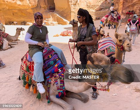Woman Riding Camel in Petra