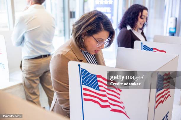 americans voting in an election - social class stock pictures, royalty-free photos & images