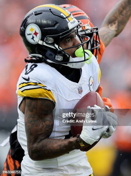 Diontae Johnson of the Pittsburgh Steelers catches a pass during the game against the Cincinnati Bengals at Paycor Stadium on November 26, 2023 in...