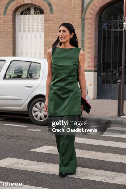 Suzi De Givenchy wears green long sleeveless top with matching oants, outside Viktor & Rolf, during the Haute Couture Spring/Summer 2024 as part of...