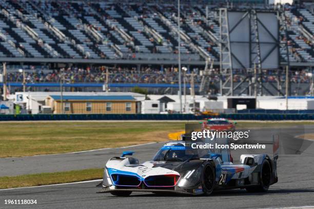 The BMW M Team RLL BMW M Hybrid V8 of Philipp Eng, Augusto Farfus, Jesse Krohn, and Dries Vanthoor during the Rolex 24 At Daytona on January 27, 2024...