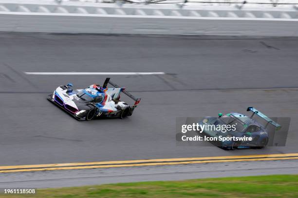 The BMW M Team RLL BMW M Hybrid V8 of Philipp Eng, Augusto Farfus, Jesse Krohn, and Dries Vanthoor during the Rolex 24 At Daytona on January 28, 2024...