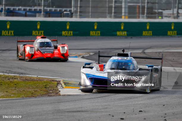 The BMW M Team RLL BMW M Hybrid V8 of Philipp Eng, Augusto Farfus, Jesse Krohn, and Dries Vanthoor during the Rolex 24 At Daytona on January 28, 2024...