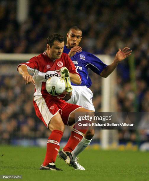 October 26: Mark Viduka of Middlesbrough and Matteo Ferrari of Everton challenge during the Carling Cup match between Everton and Middlesbrough at...