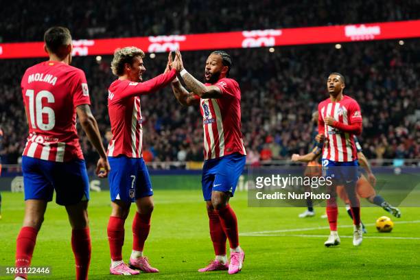 Memphis Depay centre-forward of Atletico de Madrid and Netherlands celebrates after scoring his sides first goal during the LaLiga EA Sports match...