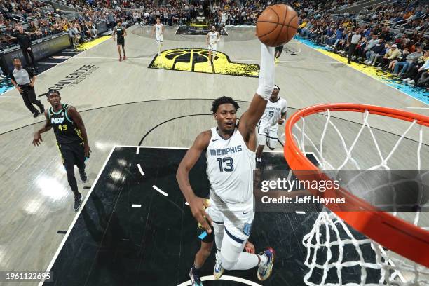 Jaren Jackson Jr. #13 of the Memphis Grizzlies dunks the ball during the game against the Indiana Pacers on January 28, 2024 at Gainbridge Fieldhouse...