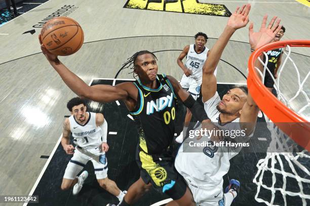 Bennedict Mathurin of the Indiana Pacers drives to the basket during the game against the Memphis Grizzlies on January 28, 2024 at Gainbridge...