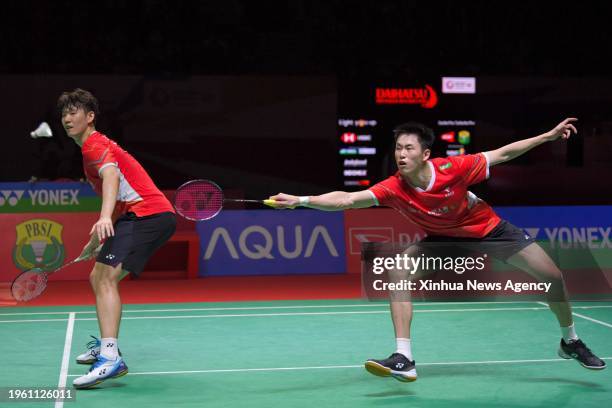 Liu Yuchen/Ou Xuanyi R compete during the men's doubles semifinal match between China's Liu Yuchen/Ou Xuanyi and Denmark's Kim Astrup/Anders Skaarup...