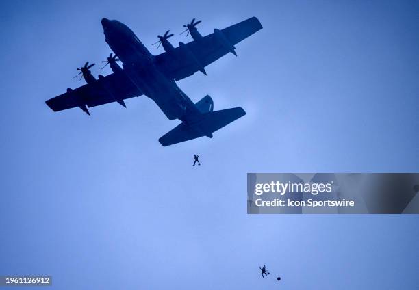 Navy Seal paratroopers exit the plane prior to the Kansas City Chiefs game versus the Baltimore Ravens in the AFC Championship Game on January 28,...