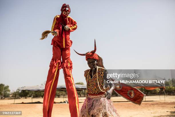 Masquerade dances to drums along the streets during the kankurang Festival in Janjanbureh on January 27, 2024. Listed as a UNESCO World Heritage Site...