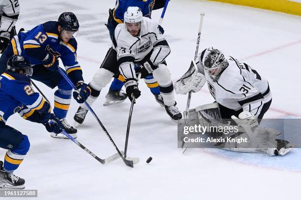 David Rittich and Matt Roy of the Los Angeles Kings defend the net against Alexey Toropchenko of the St. Louis Blues on January 28, 2024 at the...